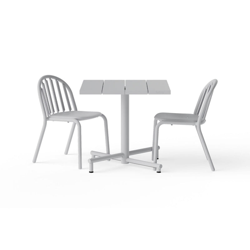 An outdoor bistro set in light grey with an 80×80 cm square table and two stackable chairs, designed for everyday outdoor use.