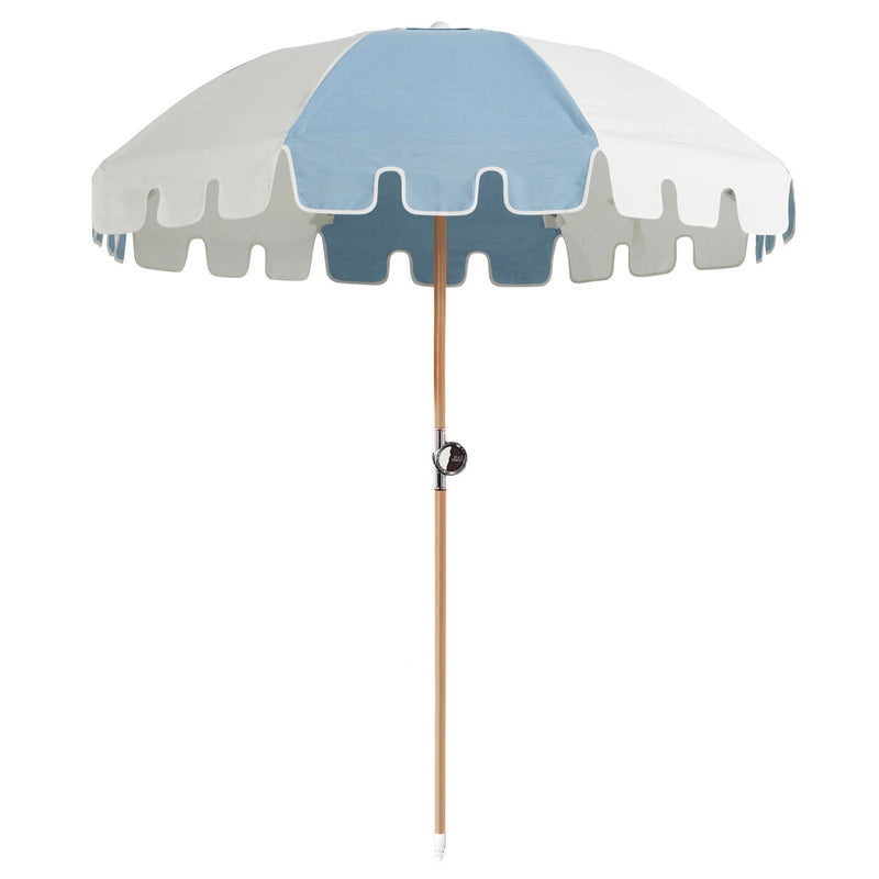 Elegant sapphire/white Luxury Umbrella by Basil Bangs with UPF50+ sun protection, marine-grade fabric, and durable hardwood pole.