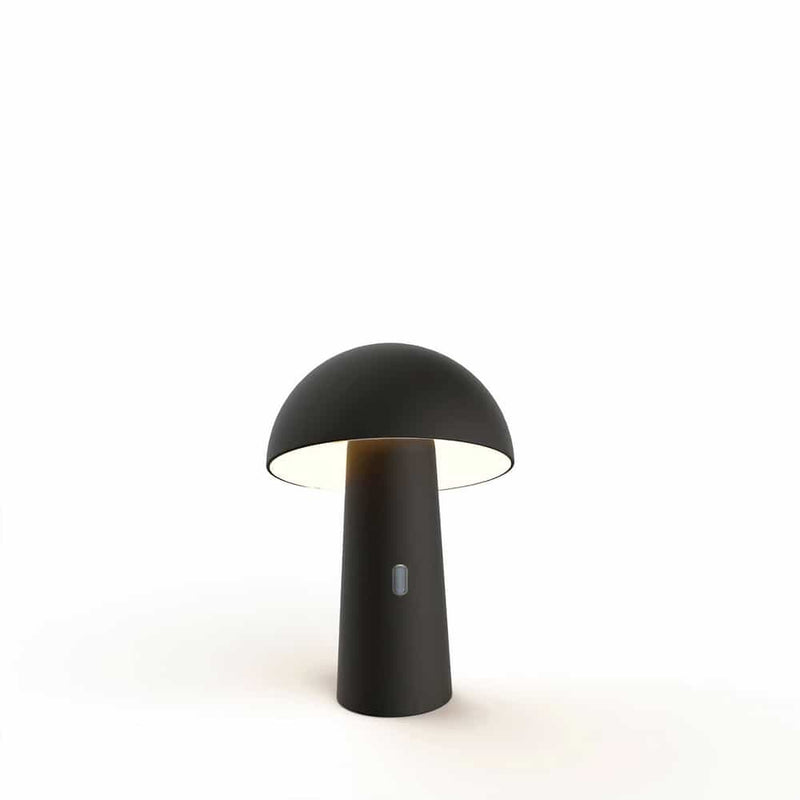 The perfect table lamp: Shitake by Newgarden. Wireless, adjustable, and long-lasting for versatile illumination.
